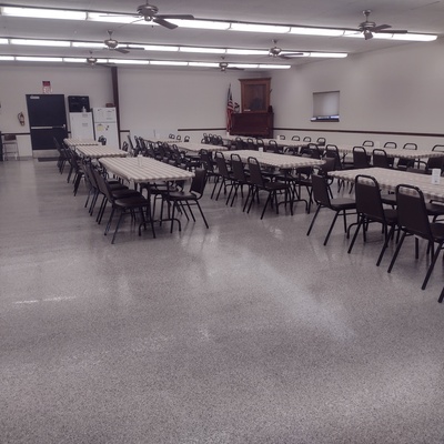Community Building Renovation-After with new flooring, tables, and paint